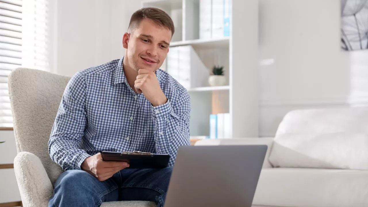 Smiling therapist with clipboard
