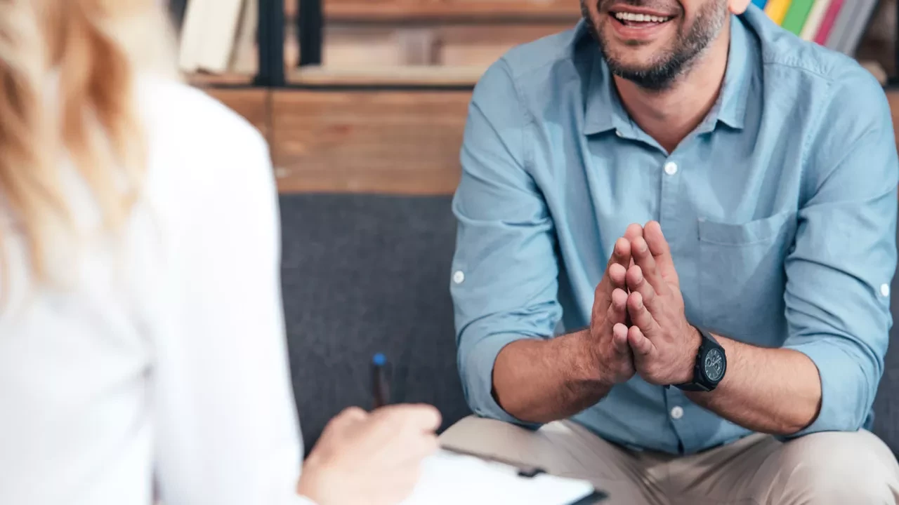 Man talking to therapist