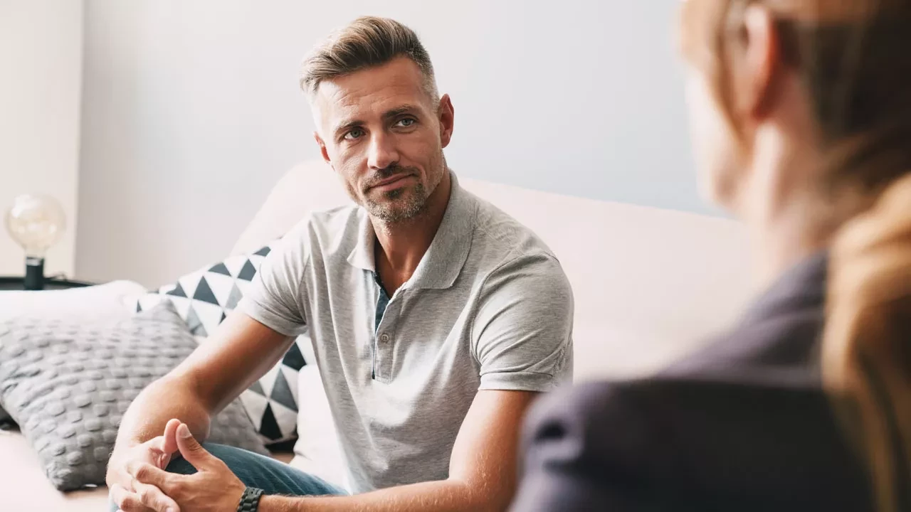 a concerned individual looking off in the distance