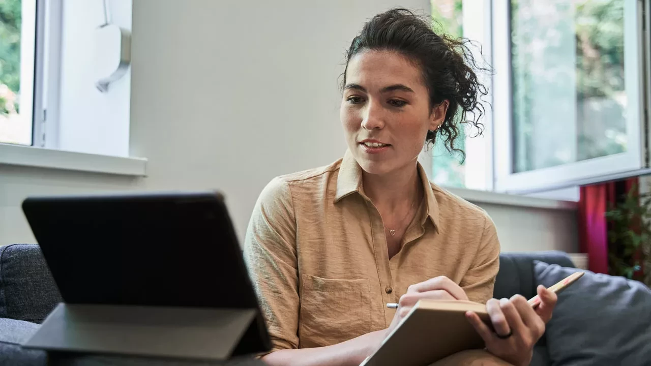 Female therapist taking notes