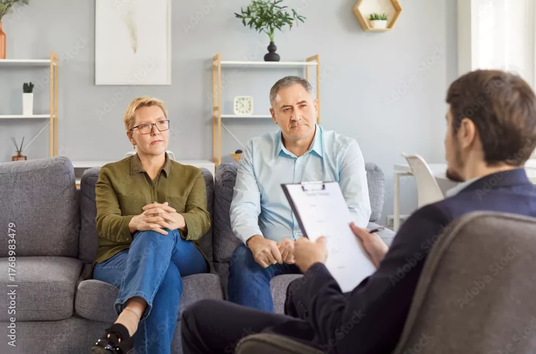 Older couple having a conversation with a therapist