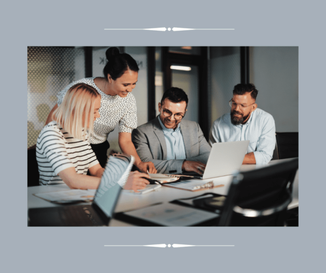 Team of people reviewing documents together